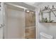 Bright bathroom with a glass-enclosed shower and stylish decor at 1600 Gulf Blvd # 512, Clearwater, FL 33767