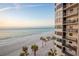 Stunning view from the condominium overlooking a sandy beach and ocean at 1600 Gulf Blvd # 512, Clearwater, FL 33767