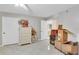 Bedroom with neutral walls, tile flooring, and boxes, offering ample space at 1600 Gulf Blvd # 512, Clearwater, FL 33767