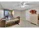 This bonus bedroom features tile flooring, a ceiling fan, and a Gulf view at 1600 Gulf Blvd # 512, Clearwater, FL 33767