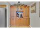 Bright kitchen featuring wood cabinets, granite countertops, and a stainless steel refrigerator at 1600 Gulf Blvd # 512, Clearwater, FL 33767