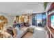 Cozy living room showcasing stylish furnishings, a plush sectional, and ocean views at 1600 Gulf Blvd # 512, Clearwater, FL 33767