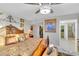 Spacious main bedroom with decorative headboard, fan, and ensuite bathroom access at 1600 Gulf Blvd # 512, Clearwater, FL 33767