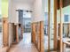 Hallway undergoing renovation with open framing, showcasing the potential for a modern design at 16312 Redington Dr, Redington Beach, FL 33708