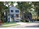 Beautiful two-story homes with lush landscaping and private driveways, perfect for luxury living at 1870 Stevenson Ave, Clearwater, FL 33755