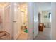 View of a clean bathroom and doorway to a living space at 2016 E View Dr, Sun City Center, FL 33573