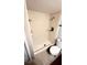 Bathroom featuring walk-in shower and toilet at 2612 Pearce Dr # 211, Clearwater, FL 33764