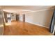 Open living room featuring hardwood floors and neutral paint at 2612 Pearce Dr # 211, Clearwater, FL 33764
