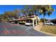 Assigned covered parking space protecting vehicles from the elements with easy access to the building at 2612 Pearce Dr # 211, Clearwater, FL 33764