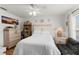 Bedroom with a ceiling fan, white walls, and a neutral color scheme at 3019 Royal Tuscan Ln, Valrico, FL 33594