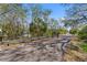 Scenic bike path with mature trees and landscaping provides a pleasant recreational area at 314 Pennsylvania Ave, Palm Harbor, FL 34683