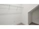 Walk-in closet with wire shelving, ready for customizable organization at 31857 Anchor Point Dr, Wesley Chapel, FL 33545