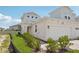 Charming townhome features a two-car garage and neutral color scheme with well maintained landscaping at 31857 Anchor Point Dr, Wesley Chapel, FL 33545