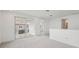 Upstairs living room with access to the balcony at 31857 Anchor Point Dr, Wesley Chapel, FL 33545
