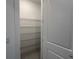 Organized pantry with multiple shelves, offering plenty of storage solutions at 31857 Anchor Point Dr, Wesley Chapel, FL 33545