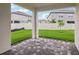 Covered patio provides a peaceful retreat, perfect for enjoying the outdoors at 31857 Anchor Point Dr, Wesley Chapel, FL 33545