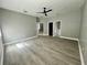 View of the main bedroom with spacious layout, offering access to closets, the main bath, and hallway at 3413 N 72Nd St, Tampa, FL 33619