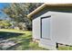 Exterior side view of detached storage shed; backyard at 39809 Pretty Pond Rd, Zephyrhills, FL 33540