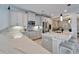 Kitchen with marble countertops, white cabinets, stainless appliances, and island with bar stool seating at 6906 Muncaster Ct, Tampa, FL 33625