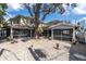 Spacious backyard featuring a gravel landscape and screened-in porch at 732 Oak Ne St, St Petersburg, FL 33701