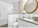 Bright bathroom with white subway tile shower and elegant vanity at 732 Oak Ne St, St Petersburg, FL 33701