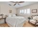 Bright bedroom with neutral walls, a comfortable bed, and plantation shutters at 732 Oak Ne St, St Petersburg, FL 33701