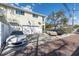Charming two-story home featuring a two-car garage and brick driveway at 732 Oak Ne St, St Petersburg, FL 33701