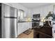 Modern kitchen features stainless steel appliances, granite counters, and white cabinets at 732 Oak Ne St, St Petersburg, FL 33701
