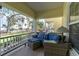 Cozy covered porch with comfortable seating and neighborhood views at 732 Oak Ne St, St Petersburg, FL 33701