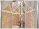 Shower featuring neutral tiling and a built-in showerhead at 732 Oak Ne St, St Petersburg, FL 33701