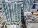 Stunning aerial view of a high rise building with pool and surrounding cityscape at 777 N Ashley Dr # 1915, Tampa, FL 33602