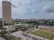 Picturesque aerial view of a city park with river and a tall building in the background at 777 N Ashley Dr # 1915, Tampa, FL 33602