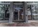 Elegant building entrance with glass doors and sidelights, showcasing a modern and inviting design at 777 N Ashley Dr # 1915, Tampa, FL 33602