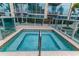 Relaxing hot tub on the balcony with beautiful tile work and secure glass surround at 777 N Ashley Dr # 1915, Tampa, FL 33602