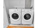 A laundry room showing a large washer and dryer with clean and organized utility space at 777 N Ashley Dr # 1915, Tampa, FL 33602
