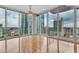 Modern living room featuring hardwood floors, large windows, and excellent city views at 777 N Ashley Dr # 1915, Tampa, FL 33602