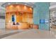 Welcoming lobby area featuring stylish wood reception desk, mosaic accent wall, and a modern aesthetic at 777 N Ashley Dr # 1915, Tampa, FL 33602