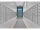 Well-lit mailroom with rows of individual mailboxes, clean lines, and functional design at 777 N Ashley Dr # 1915, Tampa, FL 33602