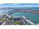 Stunning aerial view showcasing waterfront condos and the beautiful intercoastal of Florida at 7892 Sailboat Key S Blvd # 107, South Pasadena, FL 33707