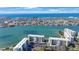 Aerial view showcasing waterfront community, ocean and city at 7892 Sailboat Key S Blvd # 107, South Pasadena, FL 33707