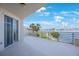 Large balcony offers beautiful views of the water and the surrounding landscape at 7892 Sailboat Key S Blvd # 107, South Pasadena, FL 33707