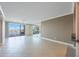 Open living space boasting large windows and balcony access at 7892 Sailboat Key S Blvd # 107, South Pasadena, FL 33707
