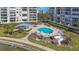 Relaxing community pool area featuring comfortable lounge chairs and a covered gazebo at 7892 Sailboat Key S Blvd # 107, South Pasadena, FL 33707