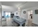 Bright and airy living space with a coastal design, tile floors, and plenty of seating at 100 Waverly Way # 101, Clearwater, FL 33756