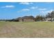 Spacious backyard with a large lawn area, ideal for outdoor activities at 10328 Celtic Ash Dr, Ruskin, FL 33573