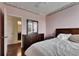 Bedroom features classic wood furniture, warm color scheme, and wood flooring at 10328 Celtic Ash Dr, Ruskin, FL 33573
