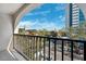 Balcony view overlooking the parking lot and buildings, showing sunny sky at 105 4Th Ne Ave # 418, St Petersburg, FL 33701
