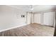 The bedroom features wood-look floors, closet space, and room for a queen-sized bed at 105 4Th Ne Ave # 418, St Petersburg, FL 33701