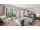 Charming primary bedroom with private balcony, neutral walls, and ceiling fan at 105 4Th Ne Ave # 418, St Petersburg, FL 33701