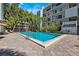 Community pool with lounge chairs offering a relaxing outdoor space for residents at 105 4Th Ne Ave # 418, St Petersburg, FL 33701
